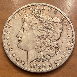 1886-0 Morgan Silver Dollar